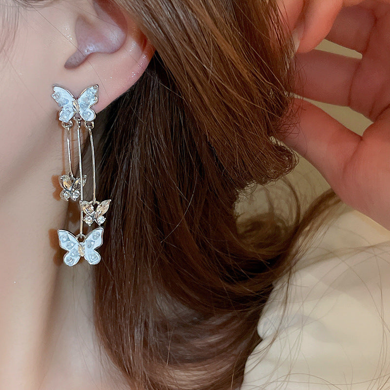 Silver Stud Rhinestone-encrusted Butterfly Tassel Earrings