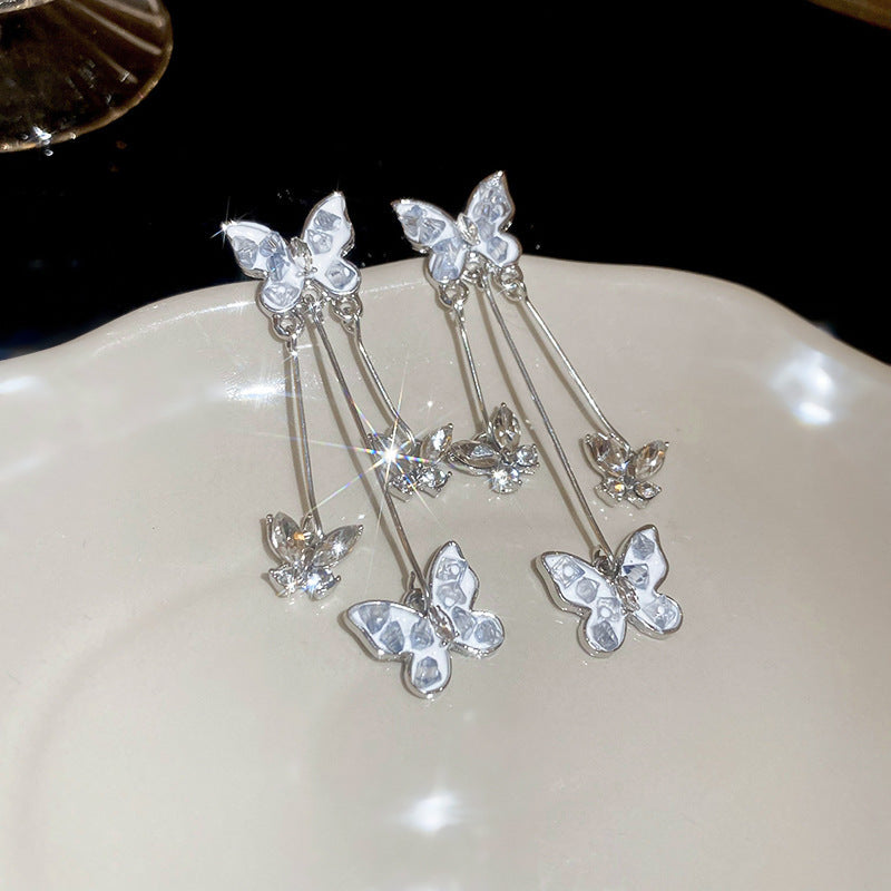 Silver Stud Rhinestone-encrusted Butterfly Tassel Earrings